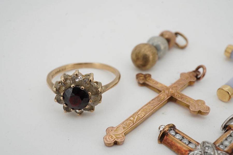 A collection of jewels, comprising: a diamond cross pendant in bicoloured 9ct gold, length 4.5cm, British hallmarks; an early 20th century gold cross pendant with foliate engraving, stamped B&S 9CT; a pale lavender jadei